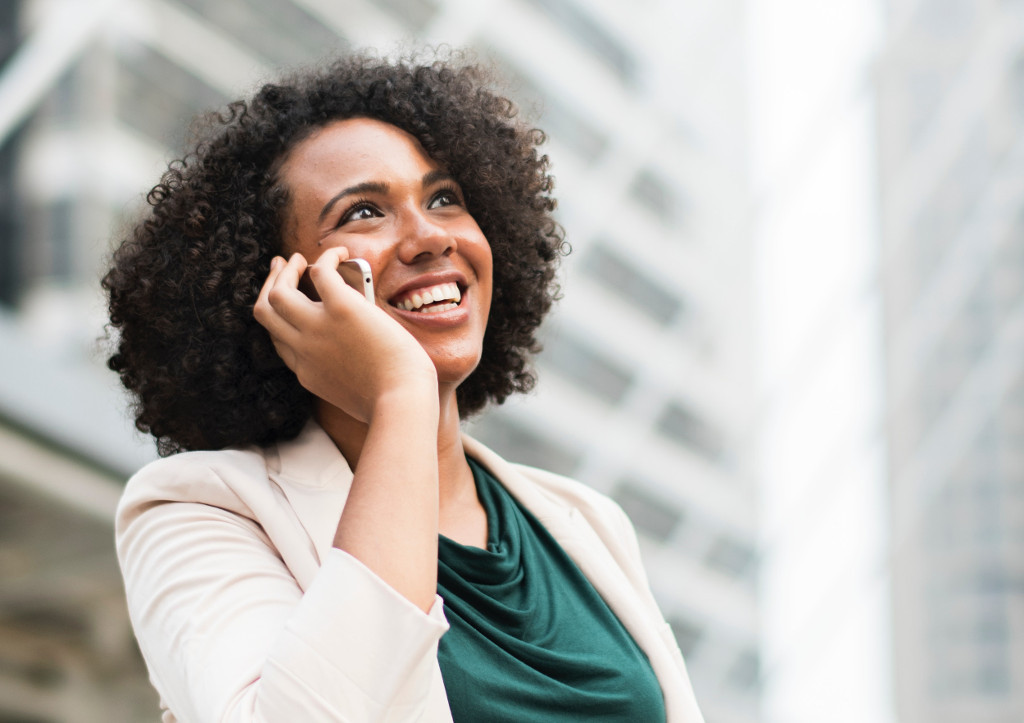 Woman satisfied with her software development partner